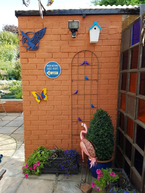 Right side - painted bird trellis/other ornaments